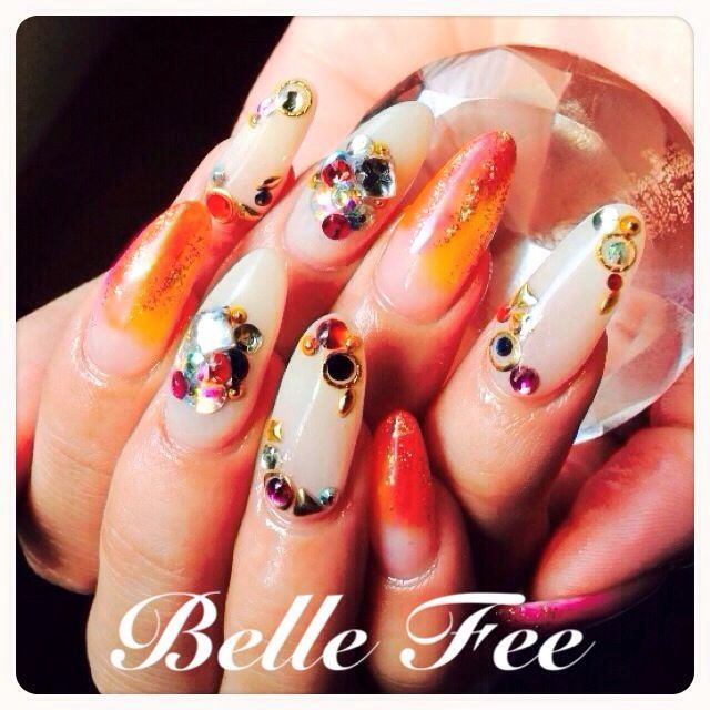 オレンジのグラデーション×ストーンたっぷりのパーツ - Belle Fee